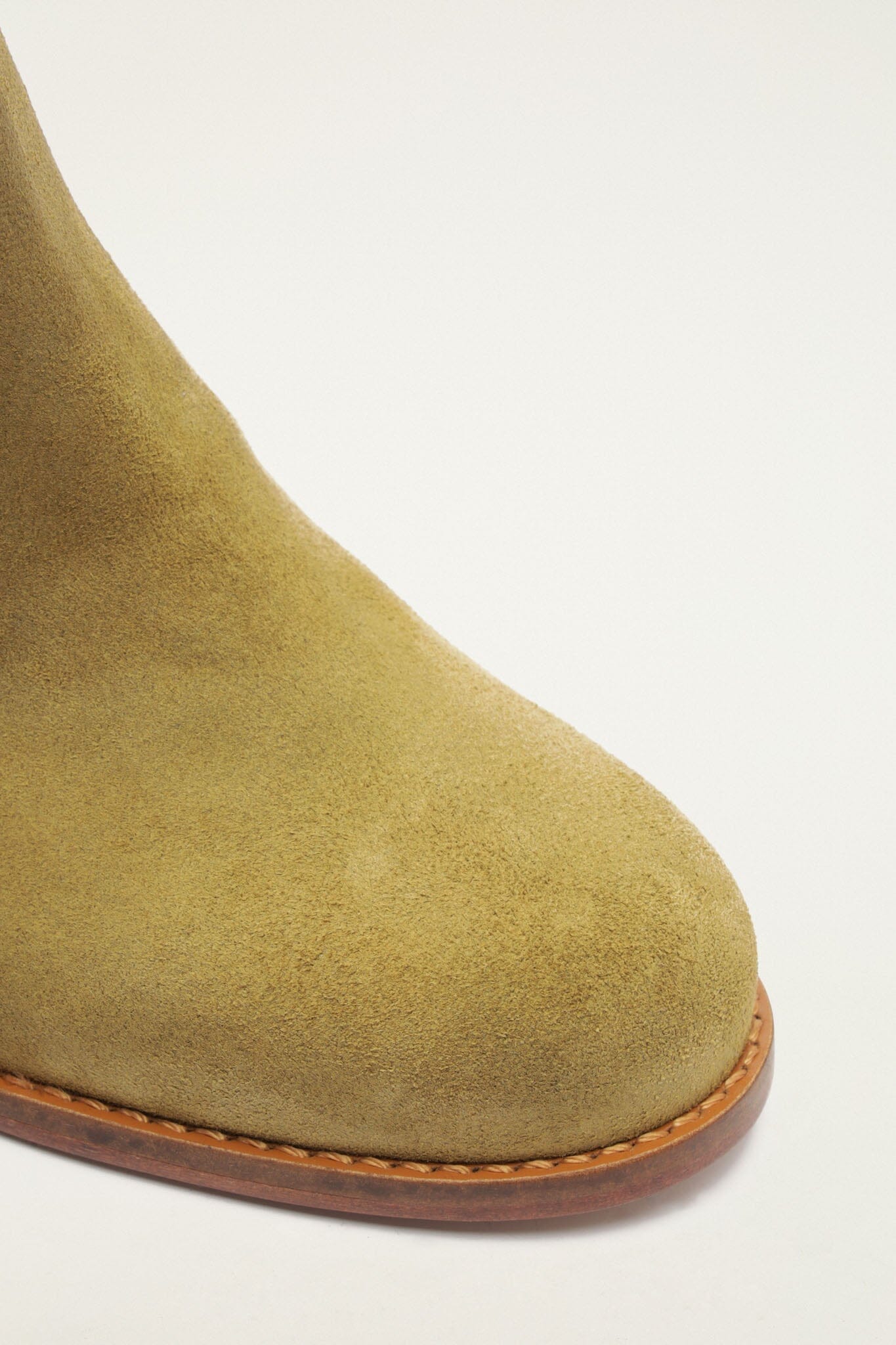 FARM Rio model wearing the Suede Riding Boot