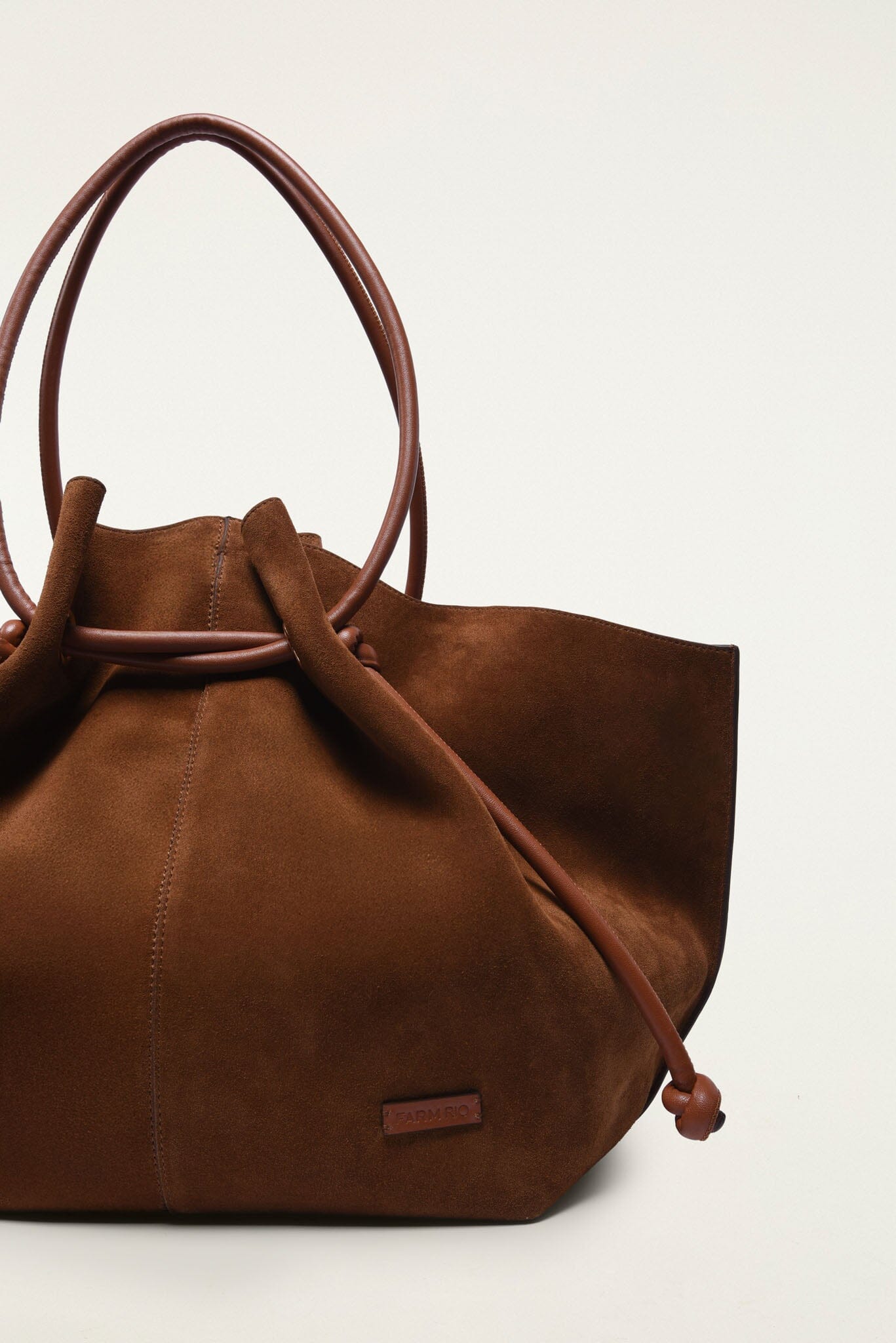 FARM Rio model wearing the Suede Tote Bag