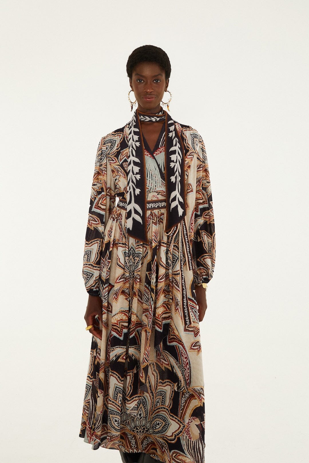 FARM Rio model wearing the Tapestry Dream Long Sleeve Midi Dress