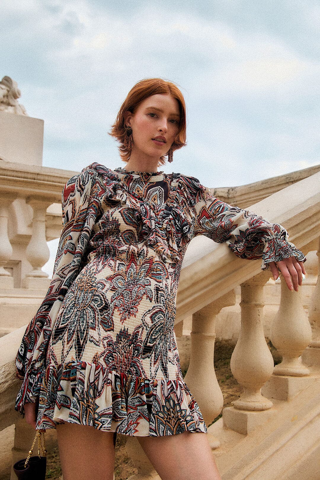 FARM Rio model wearing the Tapestry Flowers Long Sleves Mini Dress
