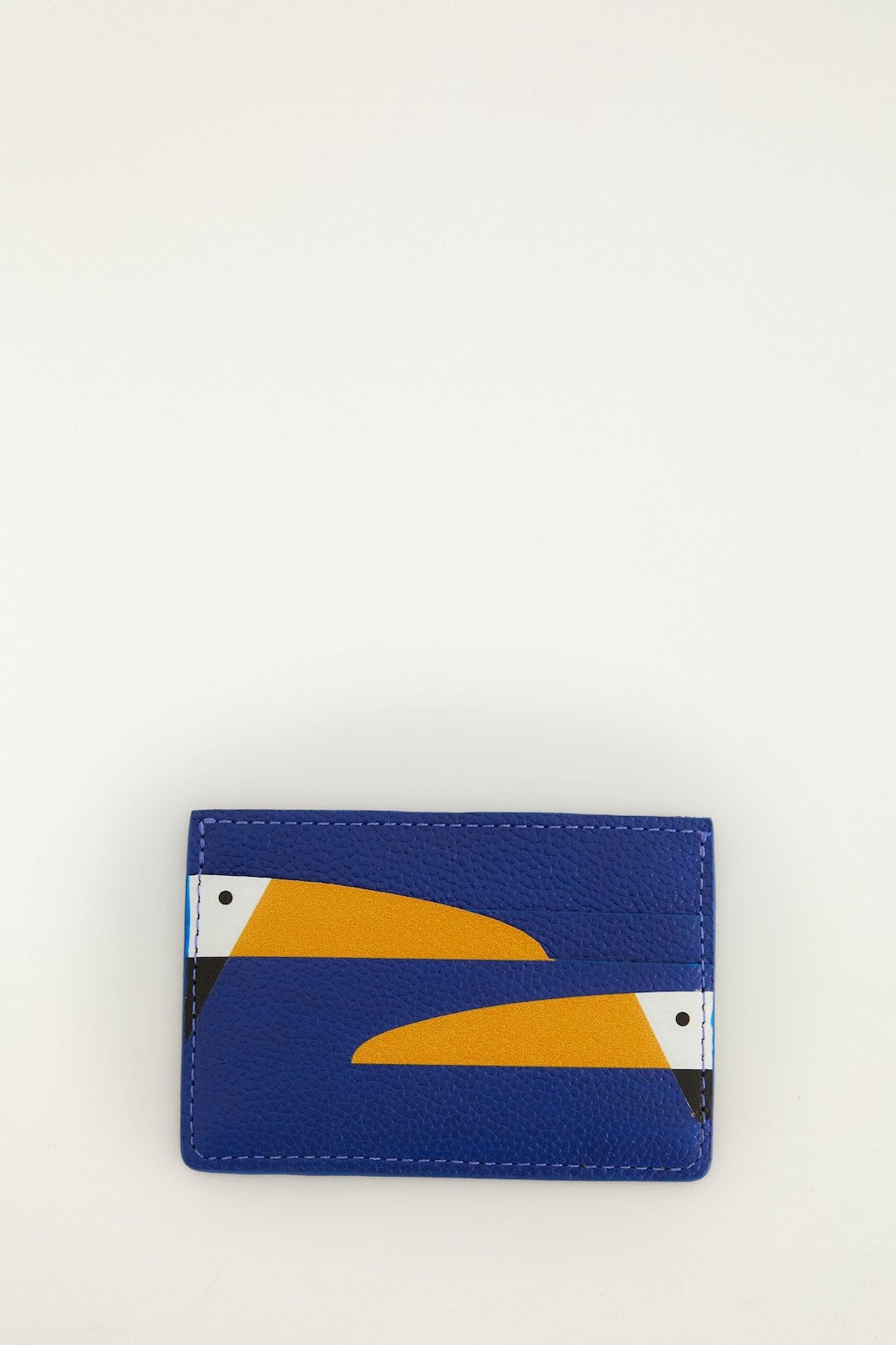 FARM Rio model wearing the Toucan Card Holder