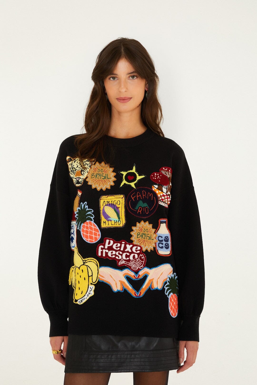 FARM Rio model wearing the Tropical Patch Knit Sweater