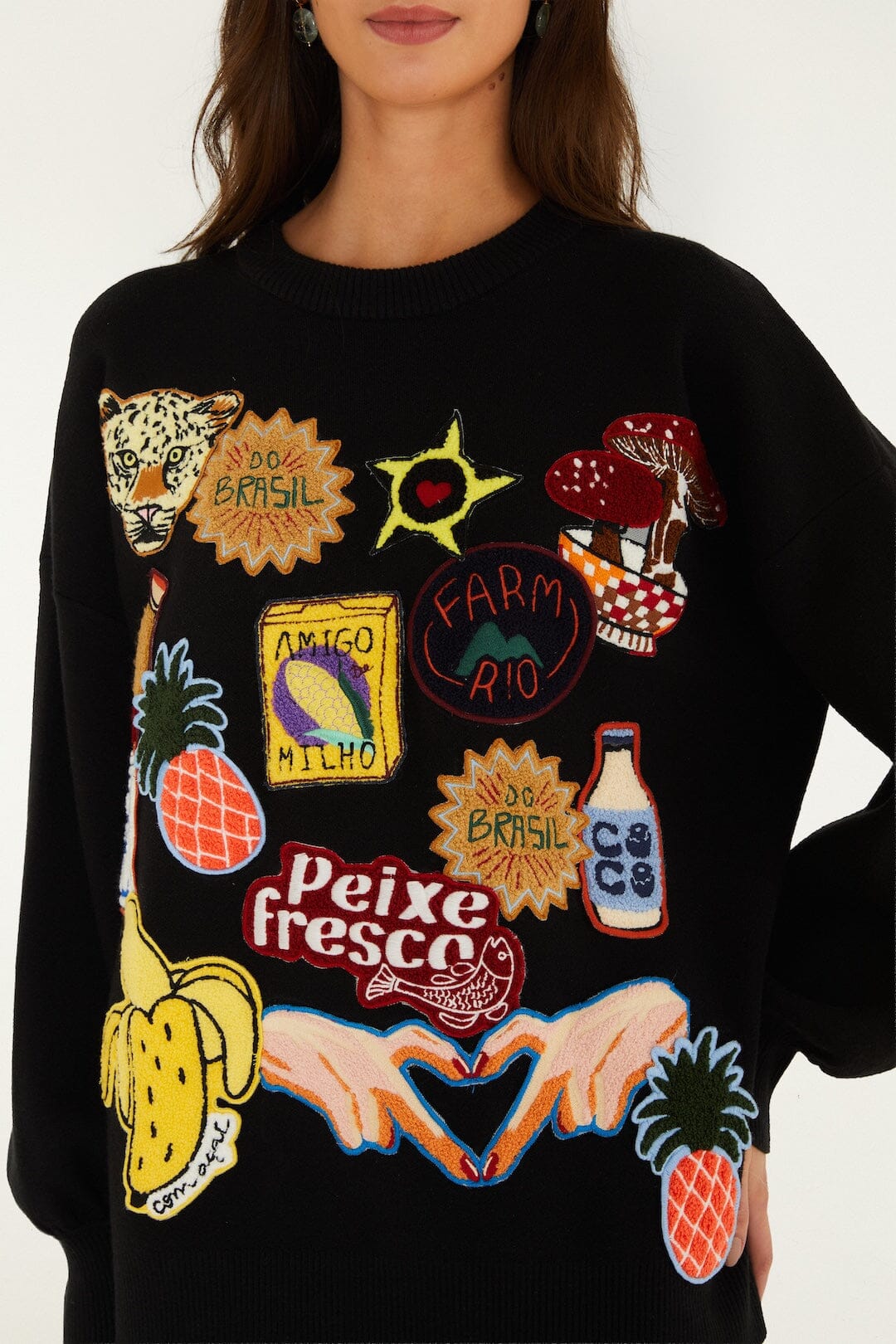 FARM Rio model wearing the Tropical Patch Knit Sweater