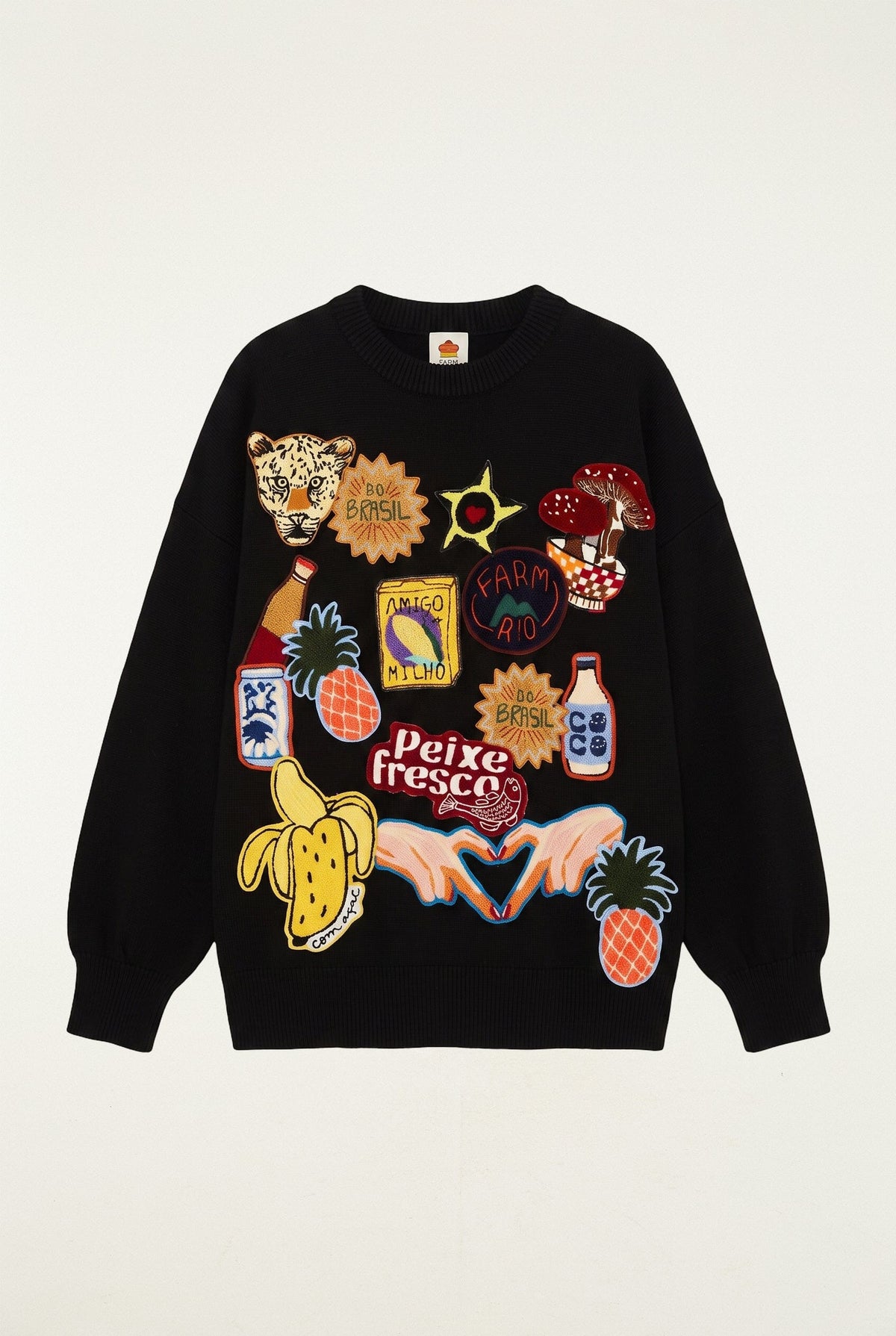 FARM Rio model wearing the Tropical Patch Knit Sweater