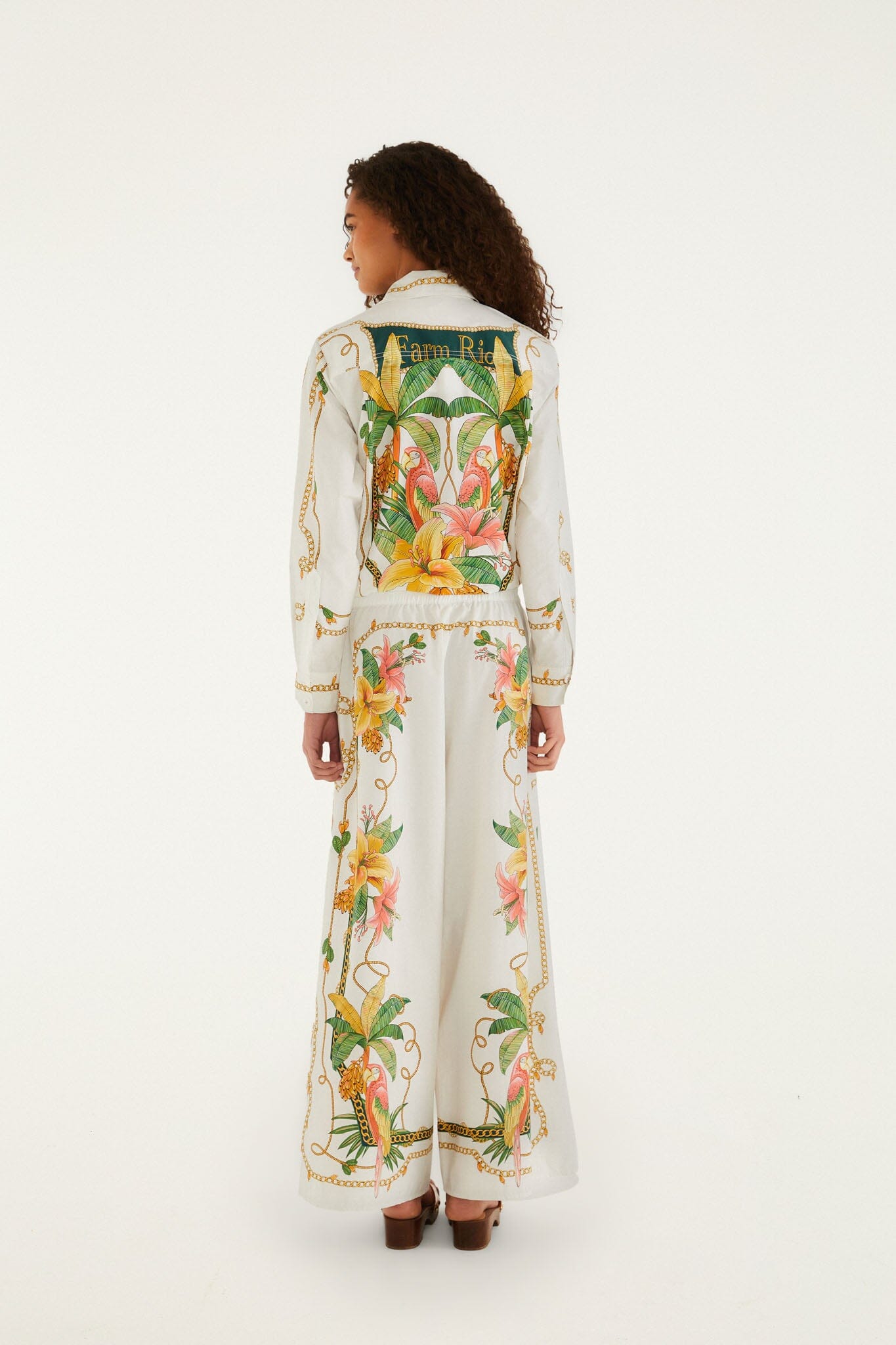 FARM Rio model wearing the Tropical Royalty Off-White Pants