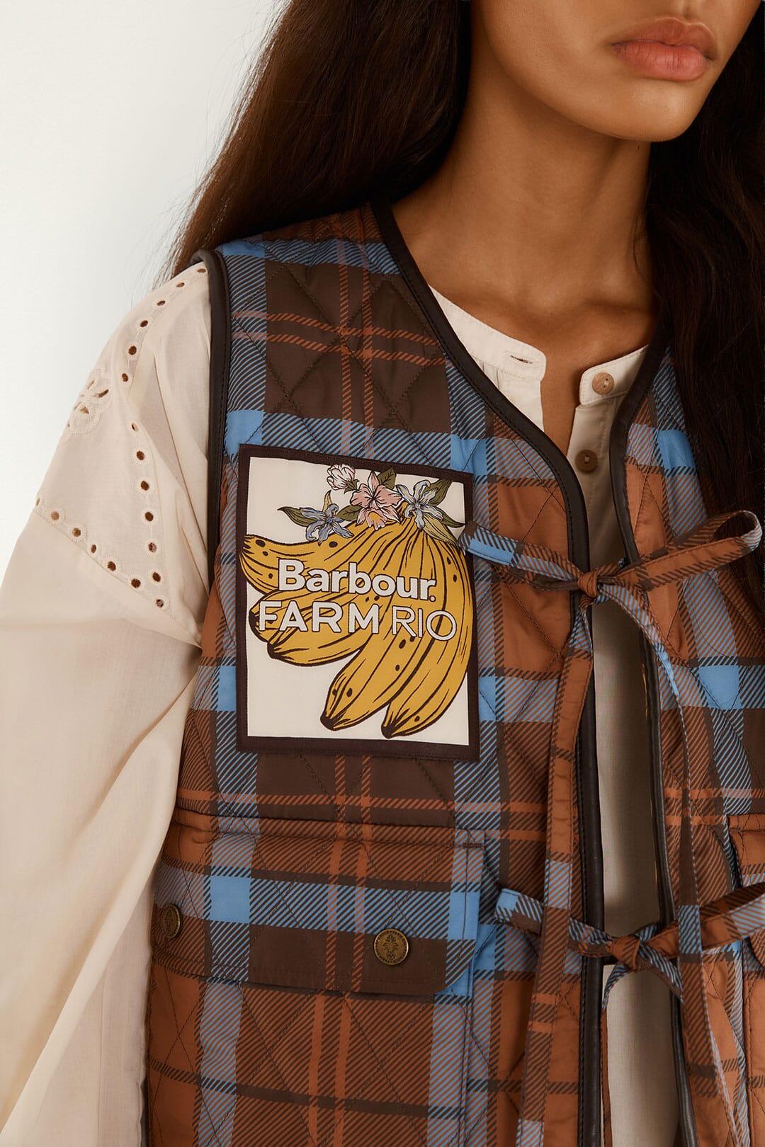 FARM Rio model wearing the Tropical Tea Gilet Vest