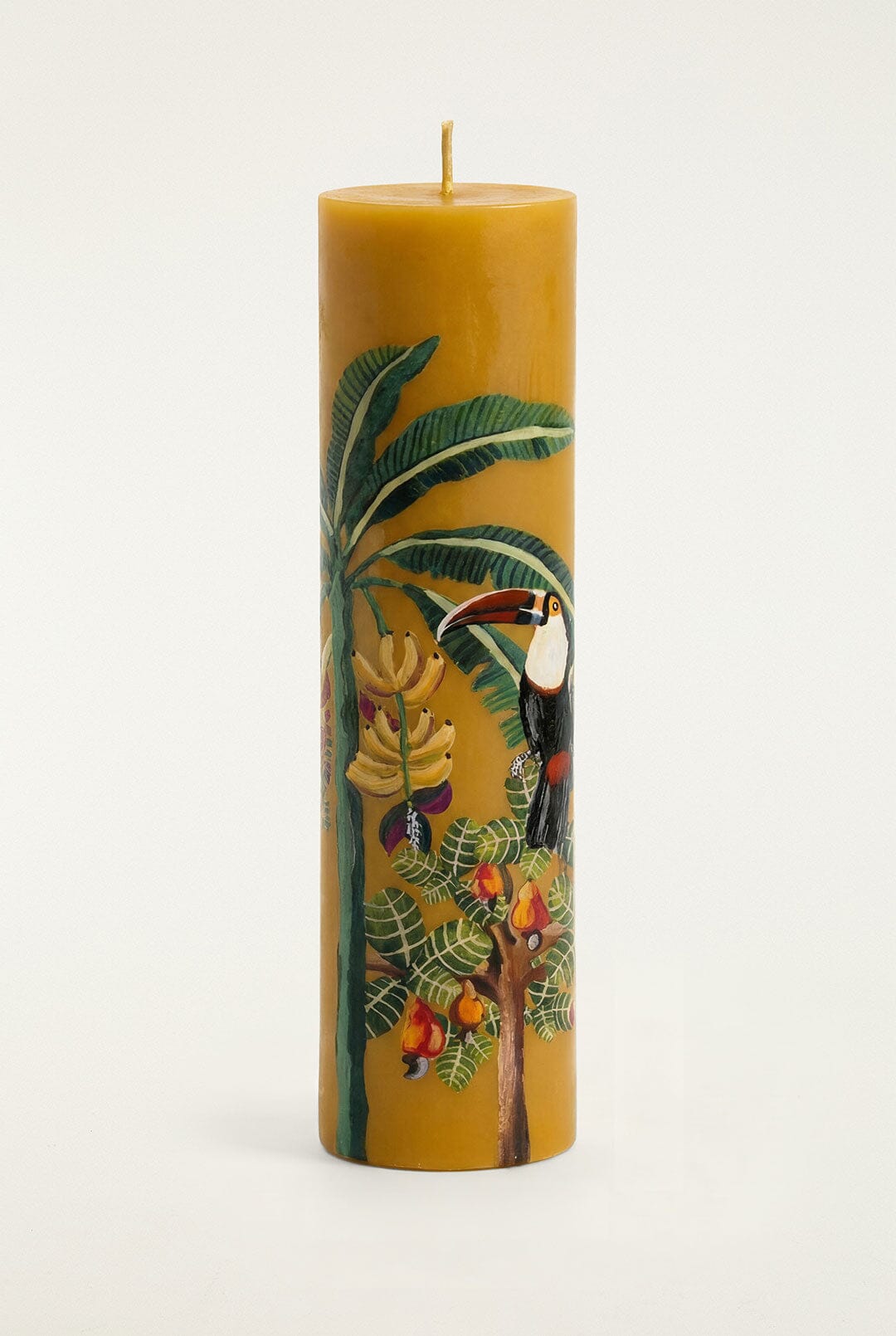 FARM Rio model wearing the Tropical Woods Pillar Candle