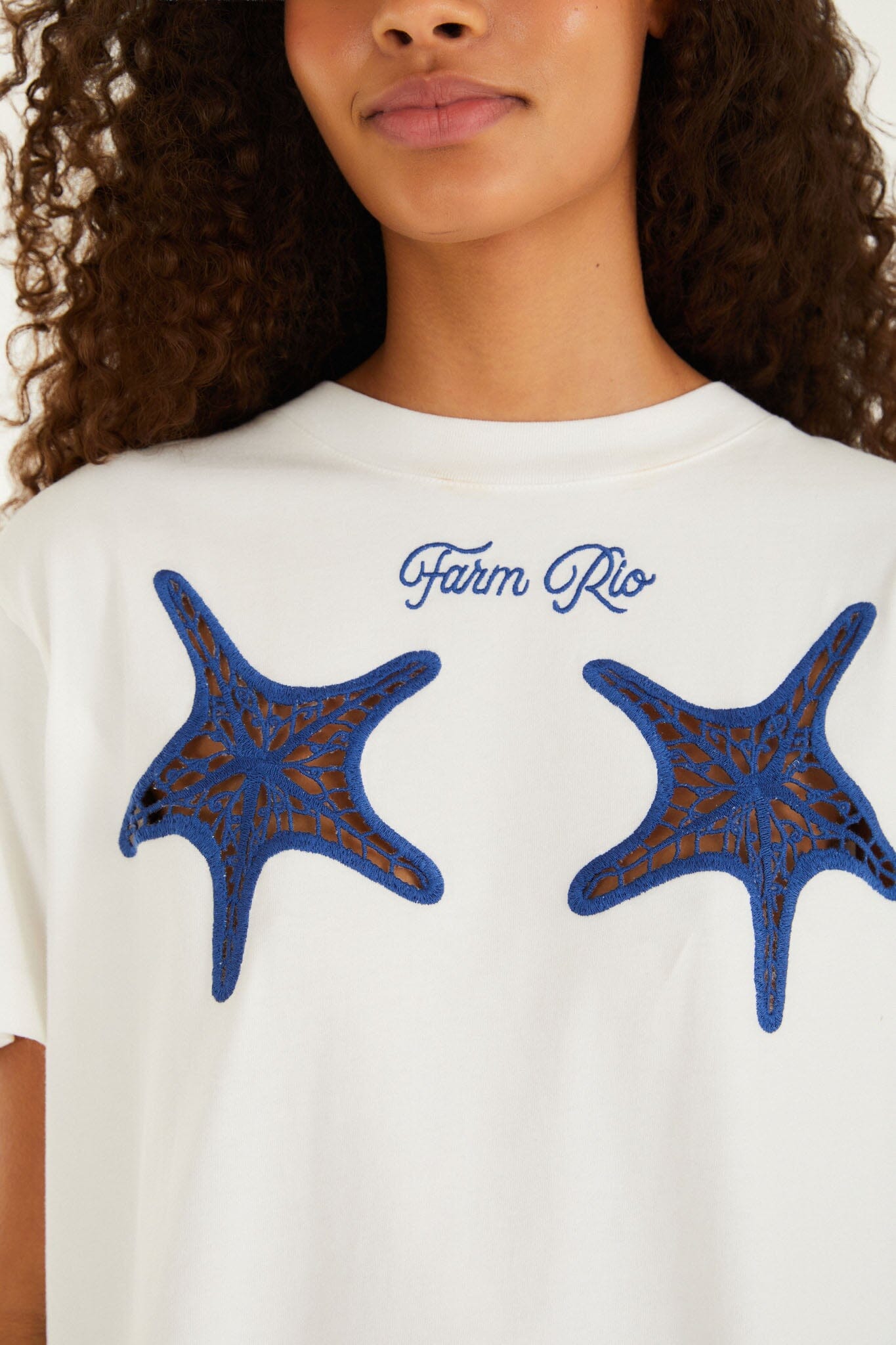 FARM Rio model wearing the White Farm Rio Starfish Cut-Out Organic Cotton T-Shirt