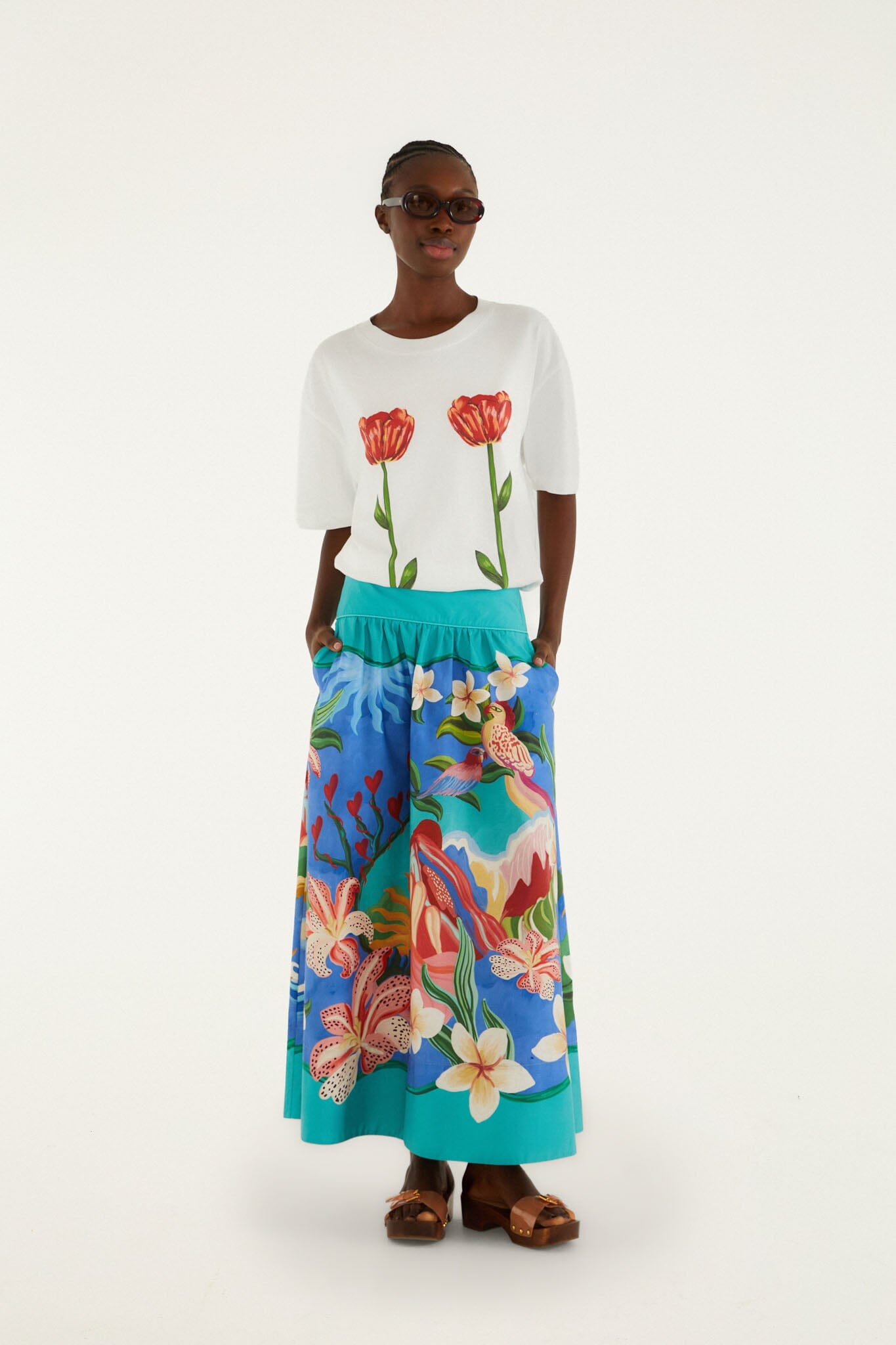 FARM Rio model wearing the White Tropical Rose Organic Cotton T-Shirt
