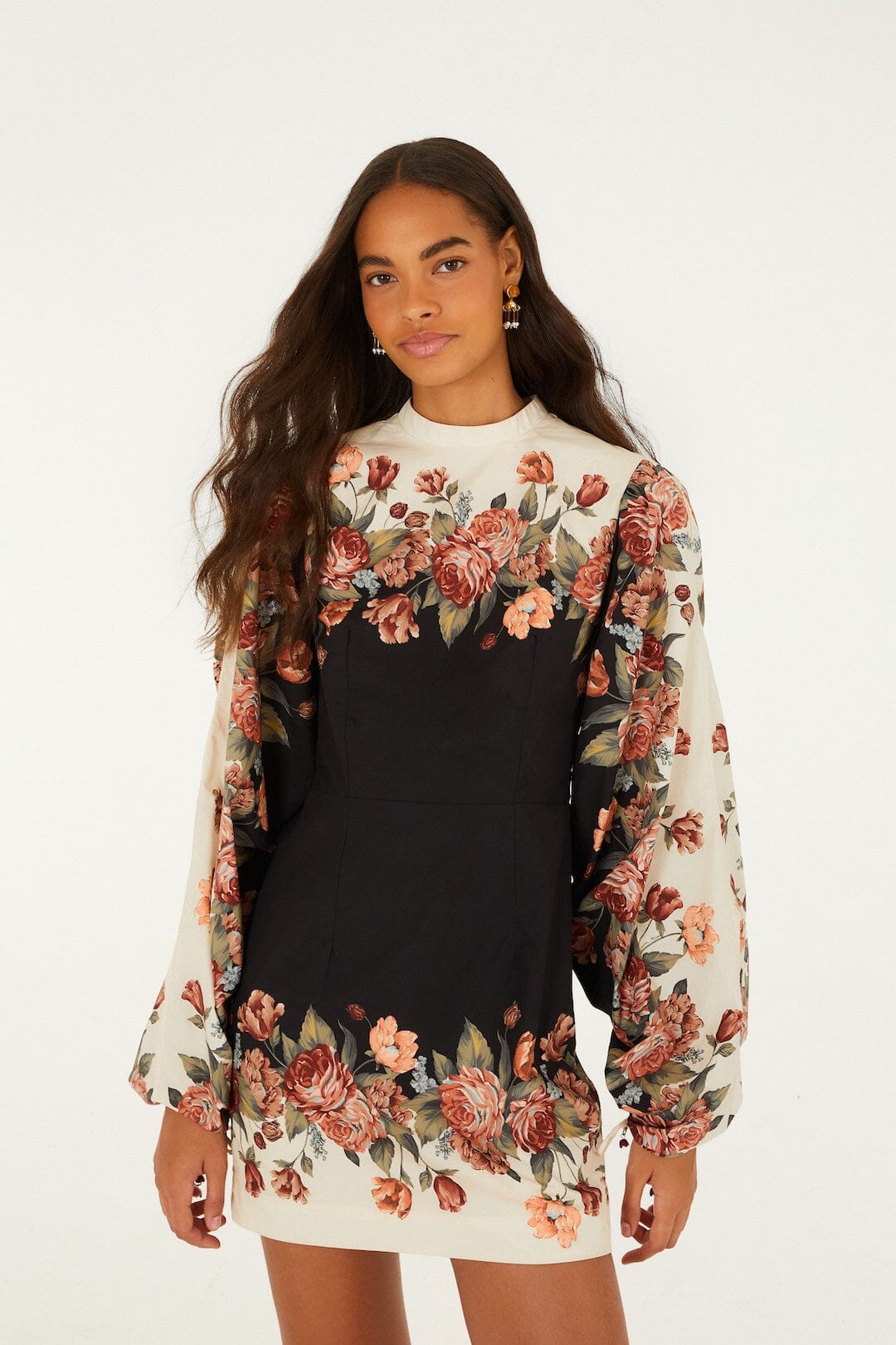 FARM Rio model wearing the Winter Floral Long Sleeve Mini Dress