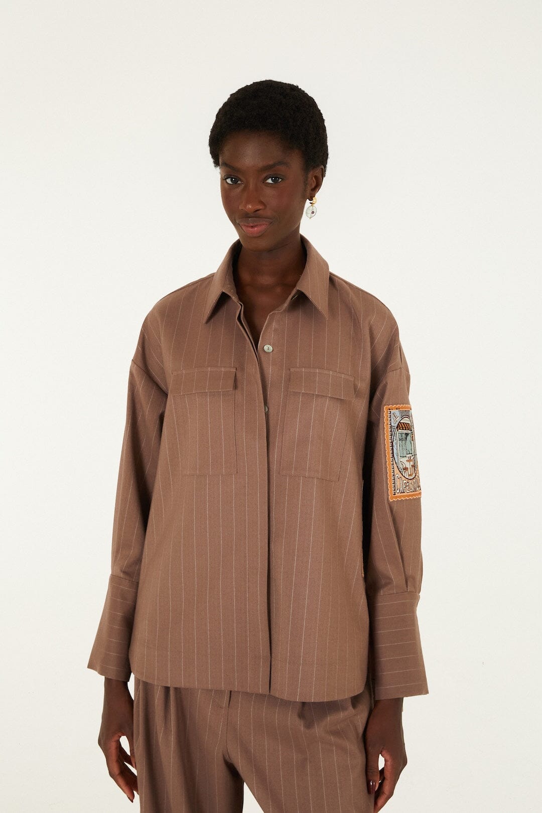 FARM Rio model wearing the Yarn Dyed Caramel Long Sleeve Shirt