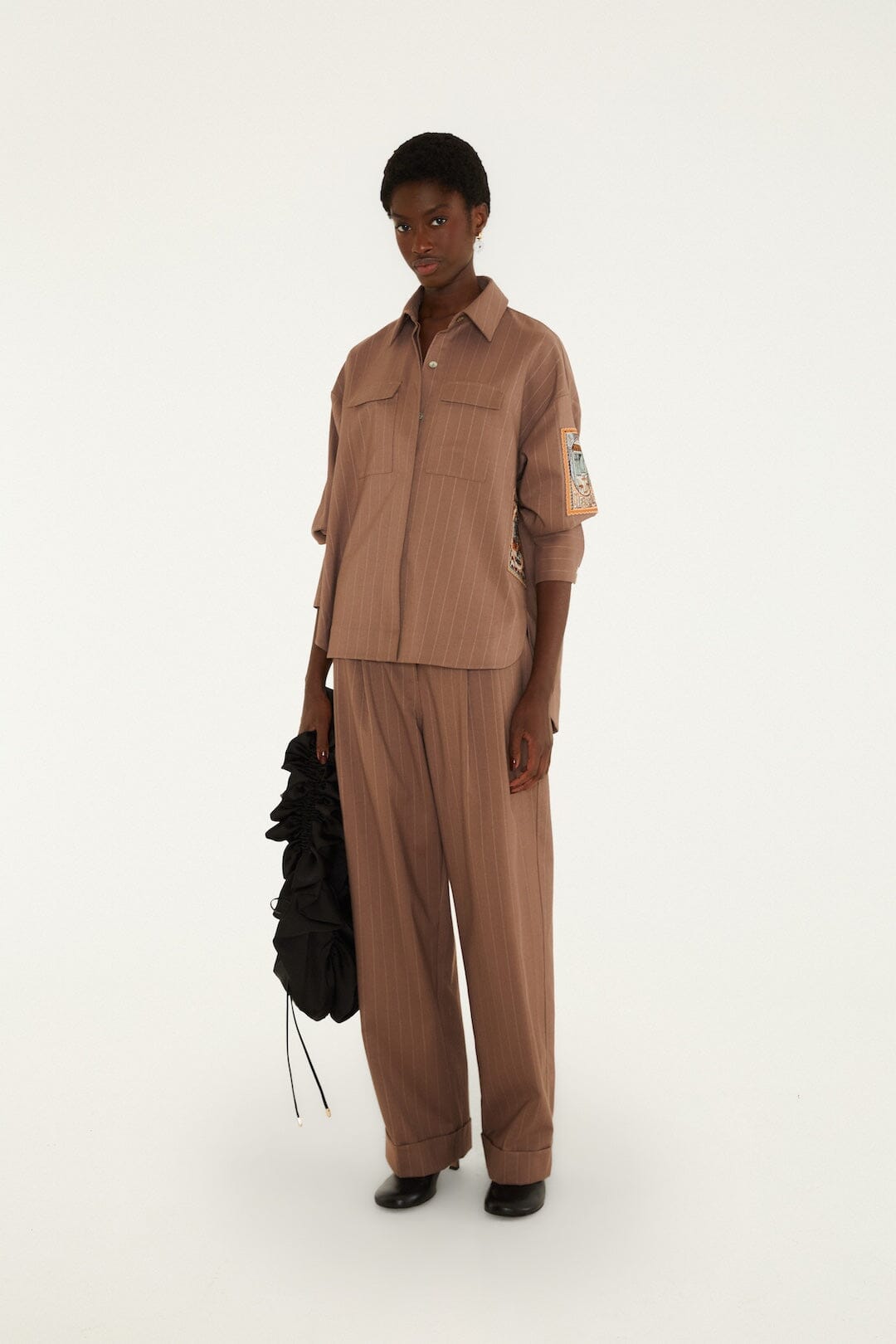 FARM Rio model wearing the Yarn Dyed Caramel Long Sleeve Shirt