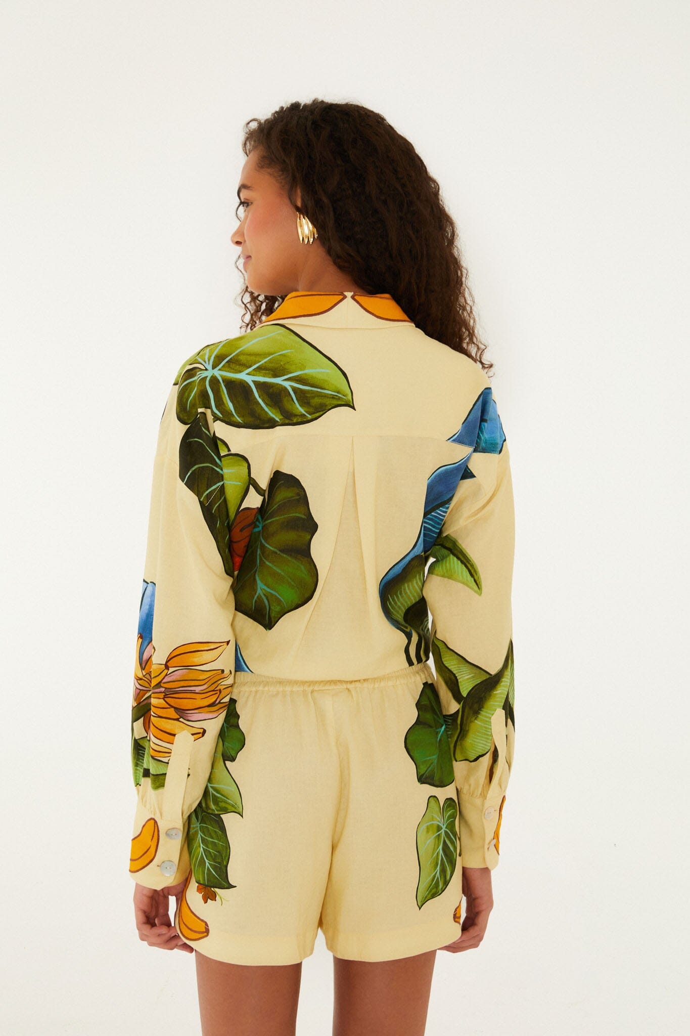 FARM Rio model wearing the Yellow Banana Grapes Drawstring Lenzing Ecovero Euroflax Shorts